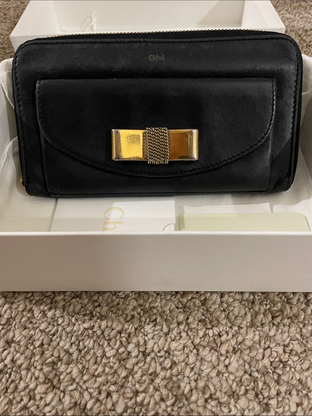 Chloé Black Leather Wallet with Gold Bow Accent